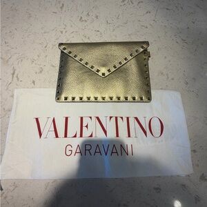 Valentino Garavani Metallic Gold Rockstud Envelope Wristlet